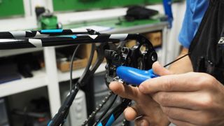Tightening bolts on a mountain bike