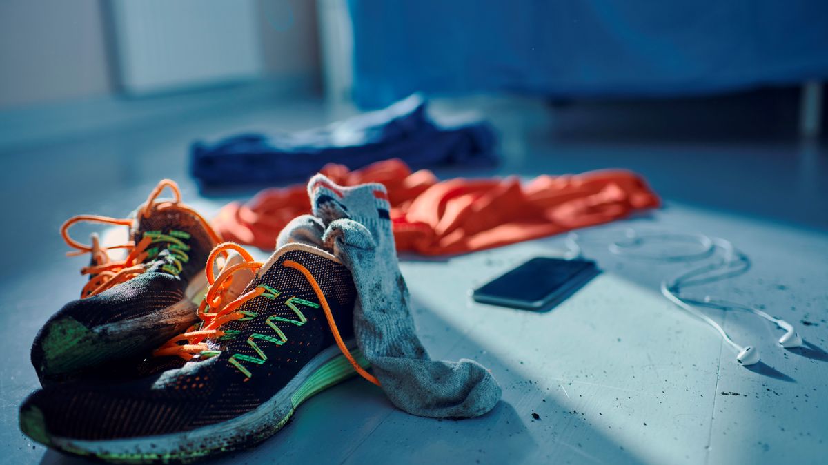 Close up of shoes and clothing of an athlete after a workout