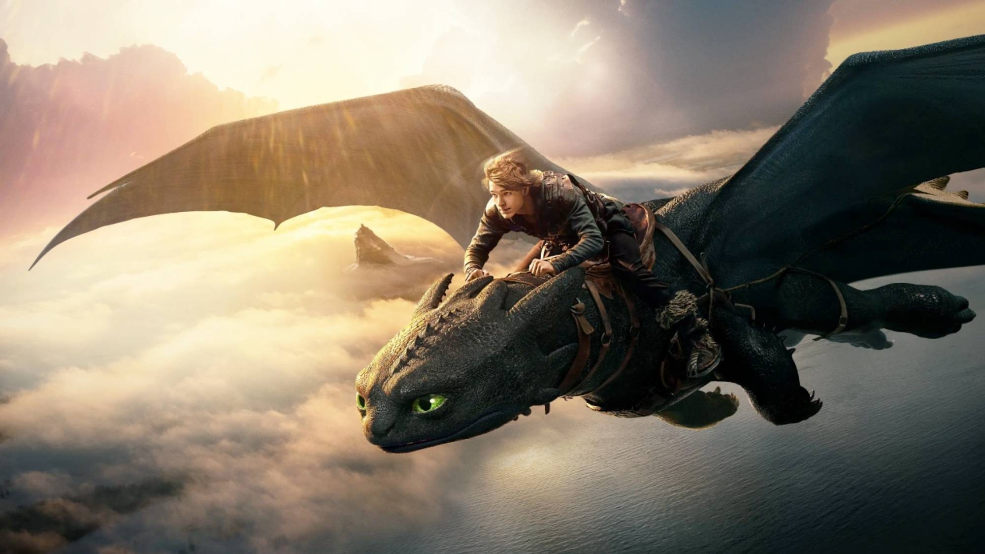 Image of Toothless the dragon and Hiccup (Mason Thames) in "How to Train Your Dragon" (2025)
