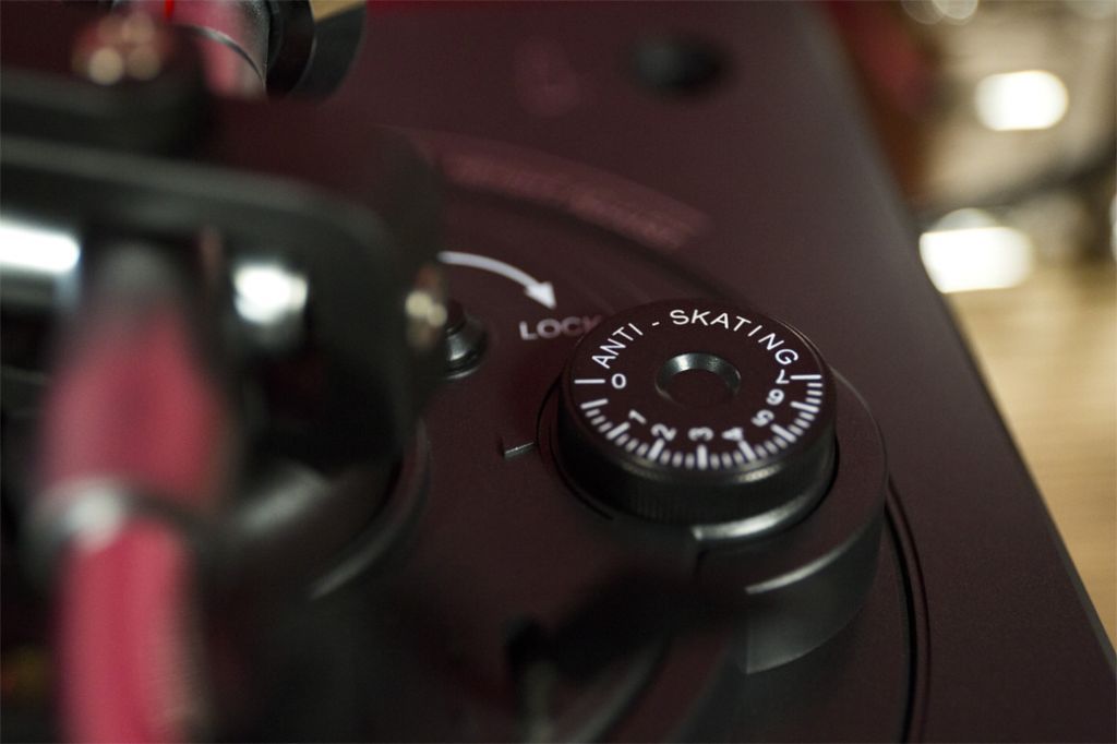 There are anti-skating controls on the TT250USB to help keep the record from skipping.