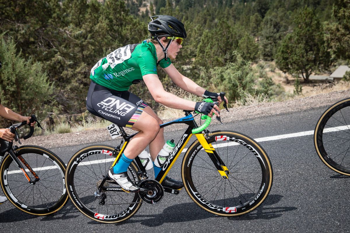 Clare Rose (DNA) gets in a break to try to gain the sprint jersey points