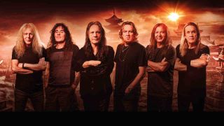 Iron Maiden posing for a photograph in 2021