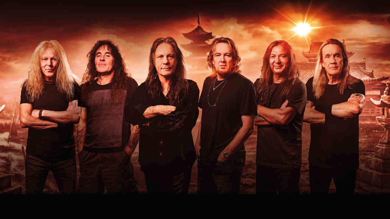 Iron Maiden posing for a photograph in 2021