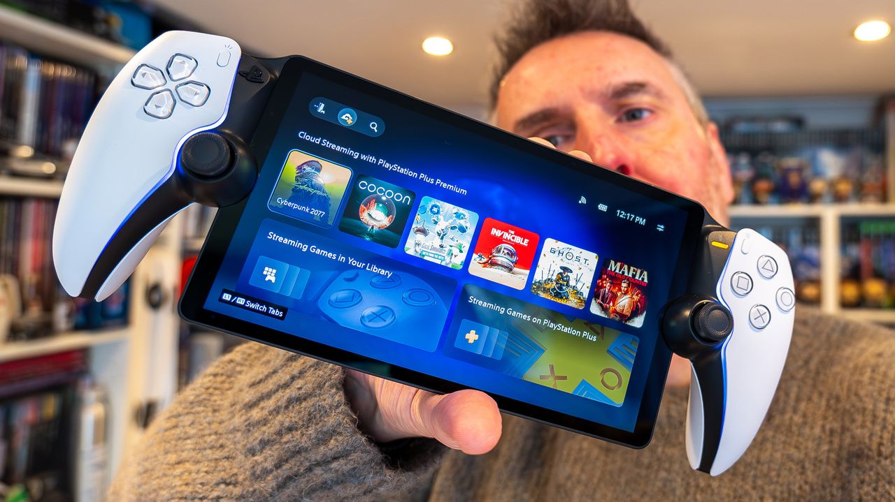 PlayStation Portal being held by T3's Rik Henderson after streaming update has been installed