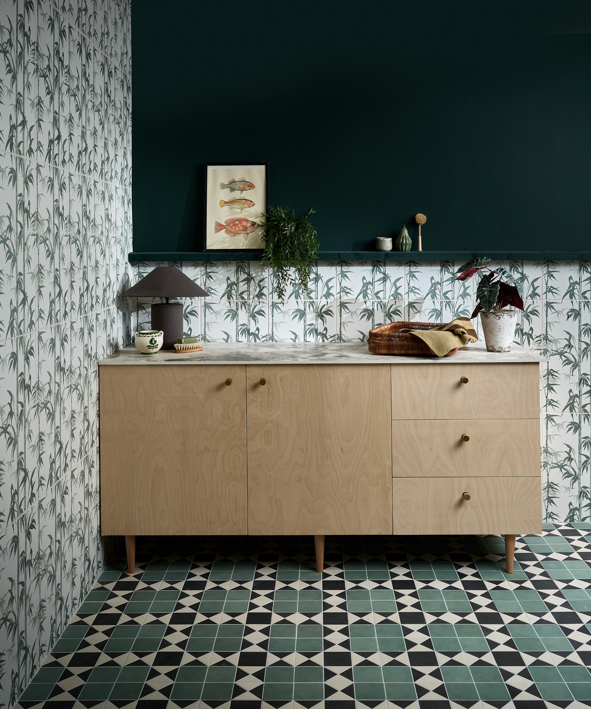bathroom with patterned tiles on floor and walls