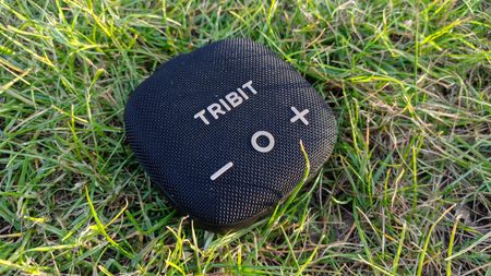 The Tribit Stormbox Micro 3 on a grassy backdrop.
