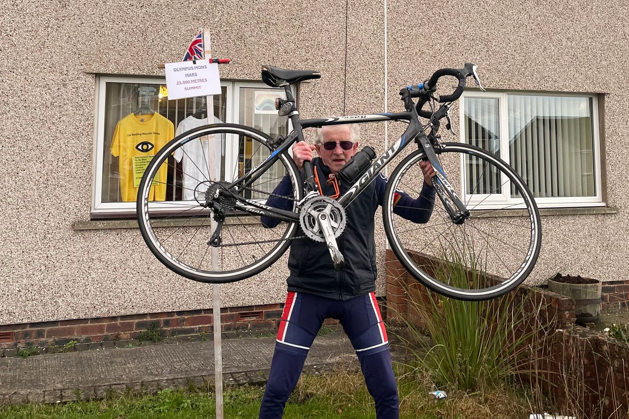 86-year-old Gerard McCarten with his Giant road bike