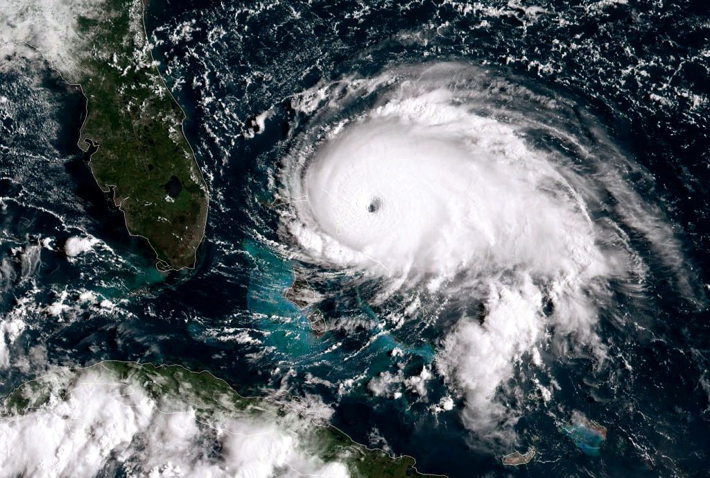 In this NOAA GOES-East satellite handout image, Hurricane Dorian, now a Cat. 5 storm, tracks towards the Florida coast taken at 13:20Z September 1, 2019 in the Atlantic Ocean.