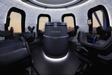 A view of the crew capsule of the New Shepard, where passengers will wear simple flight suits rather than pressurized spacesuits.