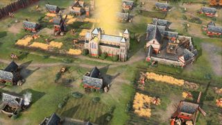 A town with an abbey in Age of Empires 4