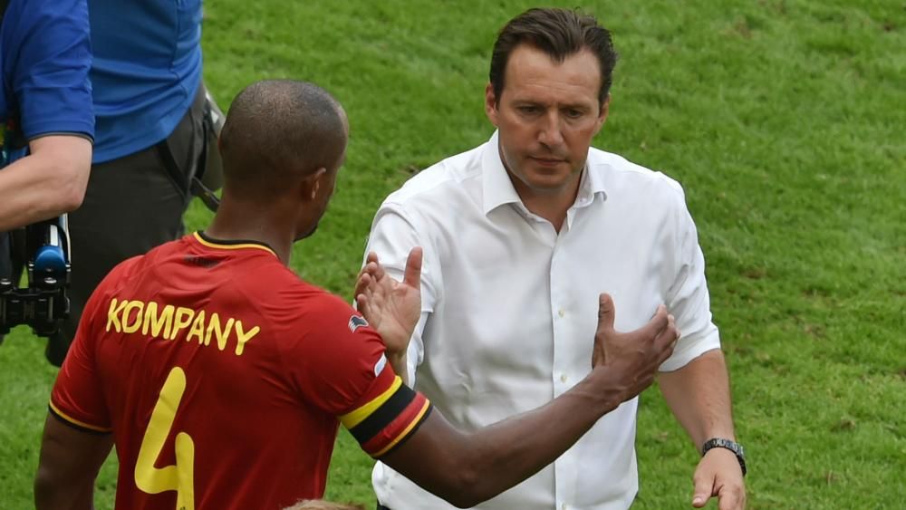 Head Coach Marc Wilmots of Belgium (center) and staff members