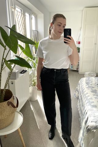 Florrie wears the COS Arch Tapered Jeans