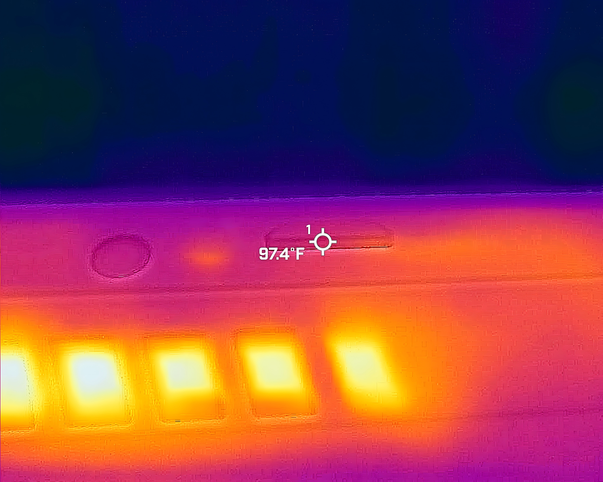 A picture taken with a thermal camera showing the microSD card reader reaches 97 degrees F.