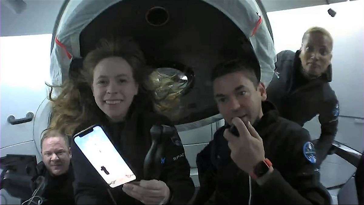 Hayley Arceneaux holds an ultrasound device that the Inspiration4 crew has used for research in space.