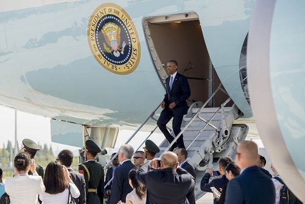 President Obama exits Air Force One.