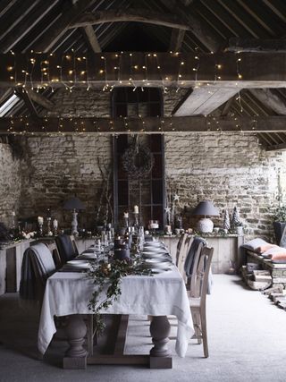 Christmas dining scene in barn by Neptune