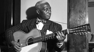 CHICAGO - CIRCA 1940: Musicians Josh White and Lead Belly (Huddie Ledbetter)