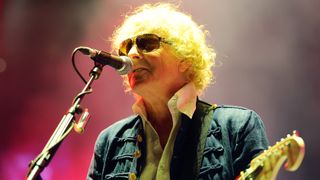 A photograph of Ian Hunter on stage in 2013