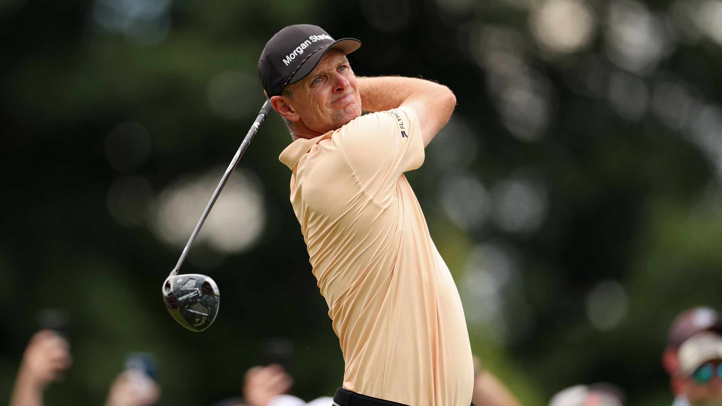 Justin Rose holds his finish on a drive