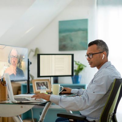A man on a video call while working from home.