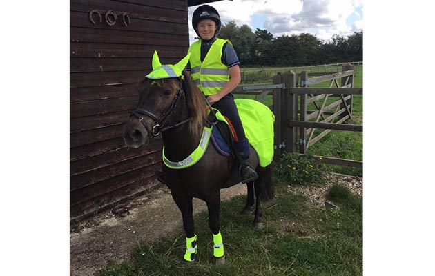 “My boy and his pony looking super-cute. The tail flap has a red flashing light too!” — Joanna Smith