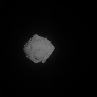 An image taken by the Hayabusa2 spacecraft's navigation camera during the MINERVA-II2 deployment procedure on Oct. 2, 2019.