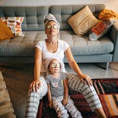 mom and daughter doing a facial together