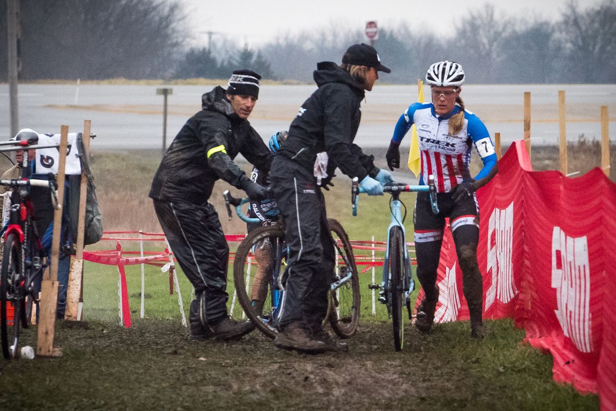 Katie Compton (Trek Collective) makes a bike change during the closing laps of racing