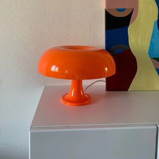 A retro orange mushroom lamp