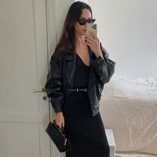 Johanna Piispa in a leather bomber jacket and Dehanche belt