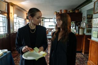 rhiannon and her sister at their father's funeral in sweetpea