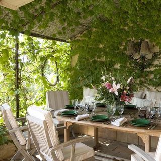 leaves with wooden table and chair