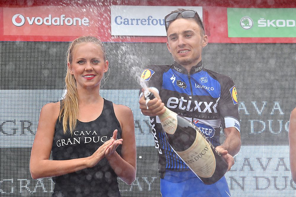 Gianluca Brambilla (Etixx-QuickStep) celebrates his stage win with a bottle of champagne