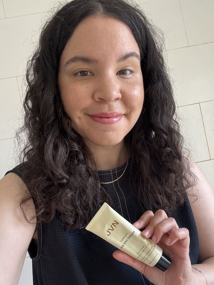 Mica Ricketts holding JVN Air Dry Cream