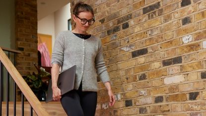 A journalist works in a home office