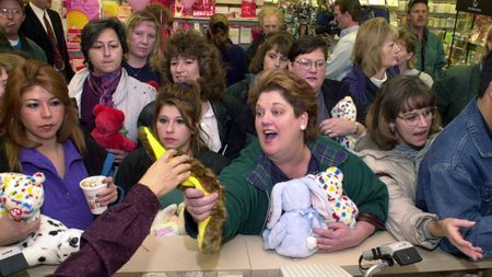 Women mob a shop counter selling Beanie Baby toys