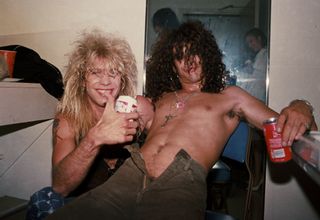 A suitably refreshed Slash (and Steve Adler) celebrate supporting Ted Nugent in 1986
