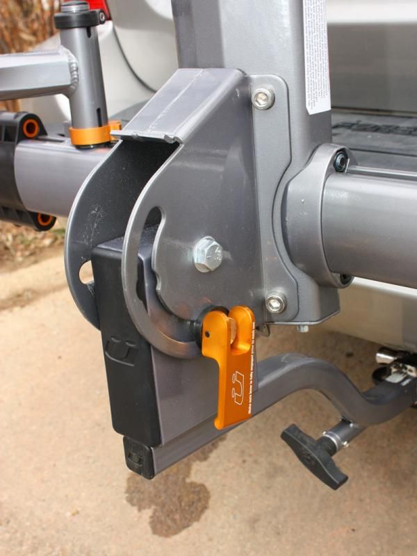 The beefy main pivot uses a handy quick-release lever to tilt the mechanism up or down.