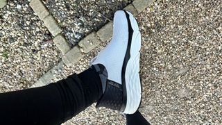 a side on view of the Skechers Slip-in Max Cushioning Smooth