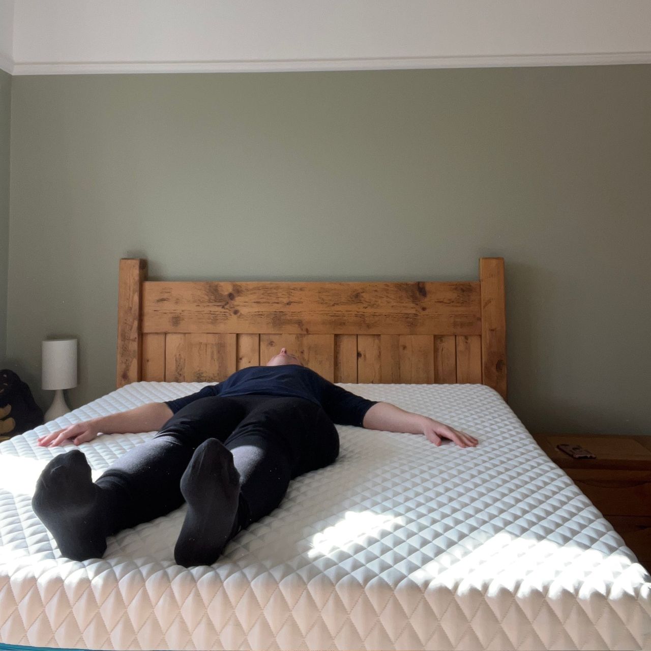 Simba Hybrid Luxe Mattress with person lying on their back