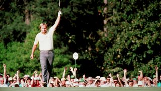 Jack Nicklaus celebrates after holing his putt for par at the 72nd hole of the 1986 Masters