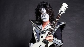 Tommy Thayer with a Gibson Custom Shop Les Paul in metallic white