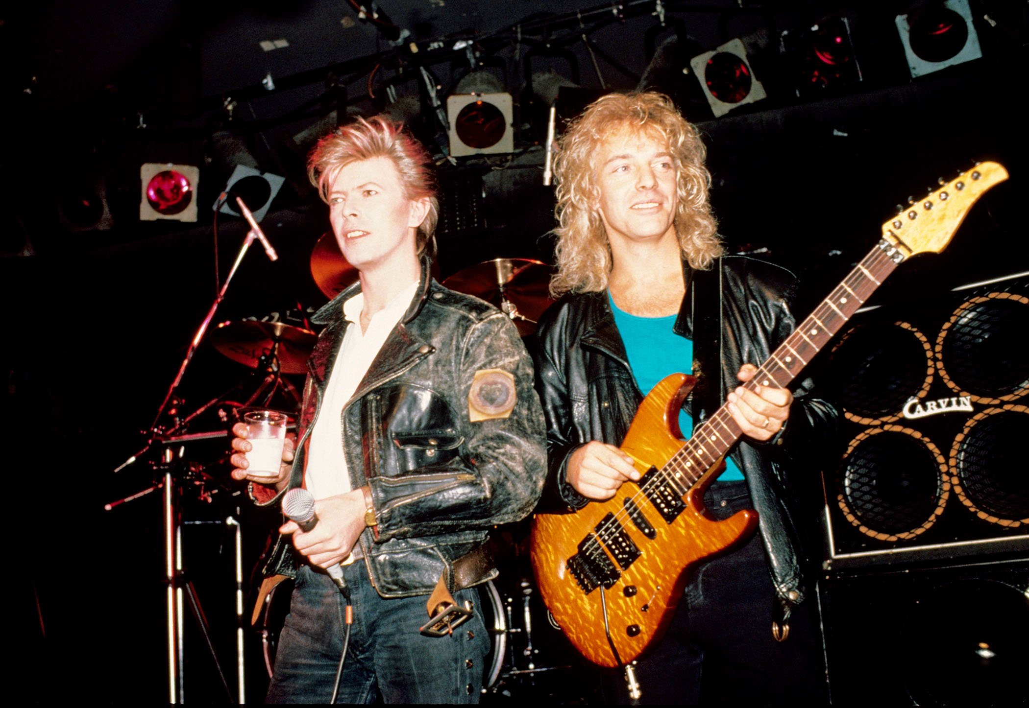 David Bowie and Peter Frampton perform live in 1987.