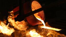 Molten gold being poured from a crucible 