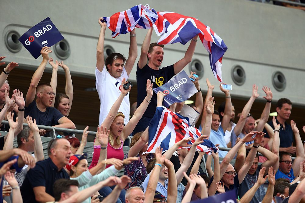 Supporters cheer on Sir Bradley Wiggins of Great Britain and Team Wiggins as he tries to break the UCI One Hour Record at Lee Valley Velopark Velodrome.