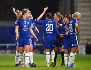 Chelsea’s Sam Kerr celebrates with her team-mates after scoring