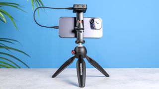 Manfrotto Pixi Mini on a blue background