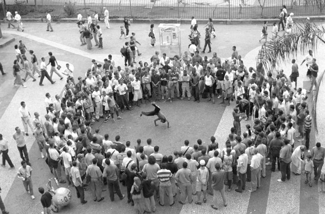 Large crowd watching a boy's dance