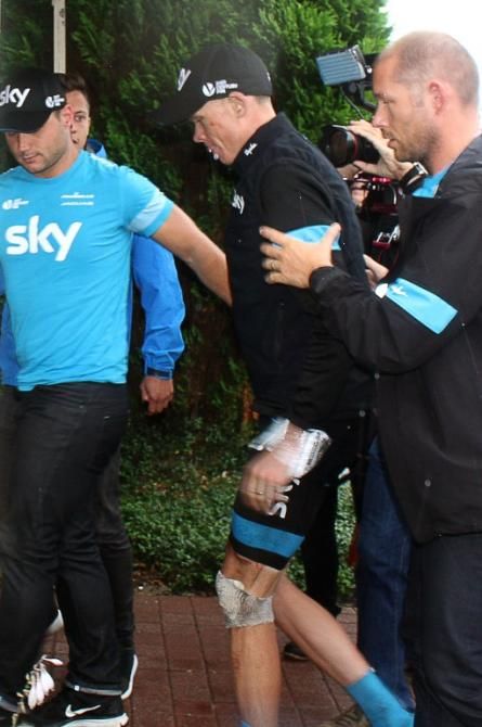 Chris Froome arrives at his hotel having abandoned the Tour de France