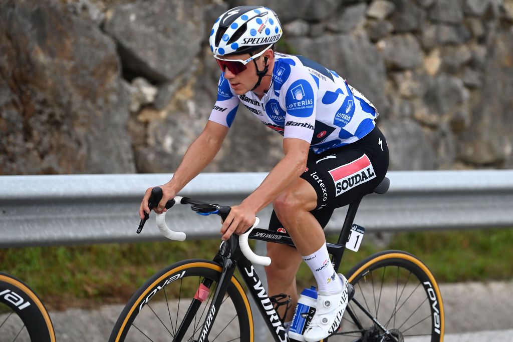 ALTU DE LANGLIRU SPAIN SEPTEMBER 13 Remco Evenepoel of Belgium and Team Soudal Quick Step Polka Dot Mountain Jersey competes in the breakaway during the 78th Tour of Spain 2023 Stage 17 a 1244km stage from Ribadesella Ribeseya to Altu de LAngliru 1555m UCIWT on September 13 2023 in Altu de LAngliru Spain Photo by Tim de WaeleGetty Images